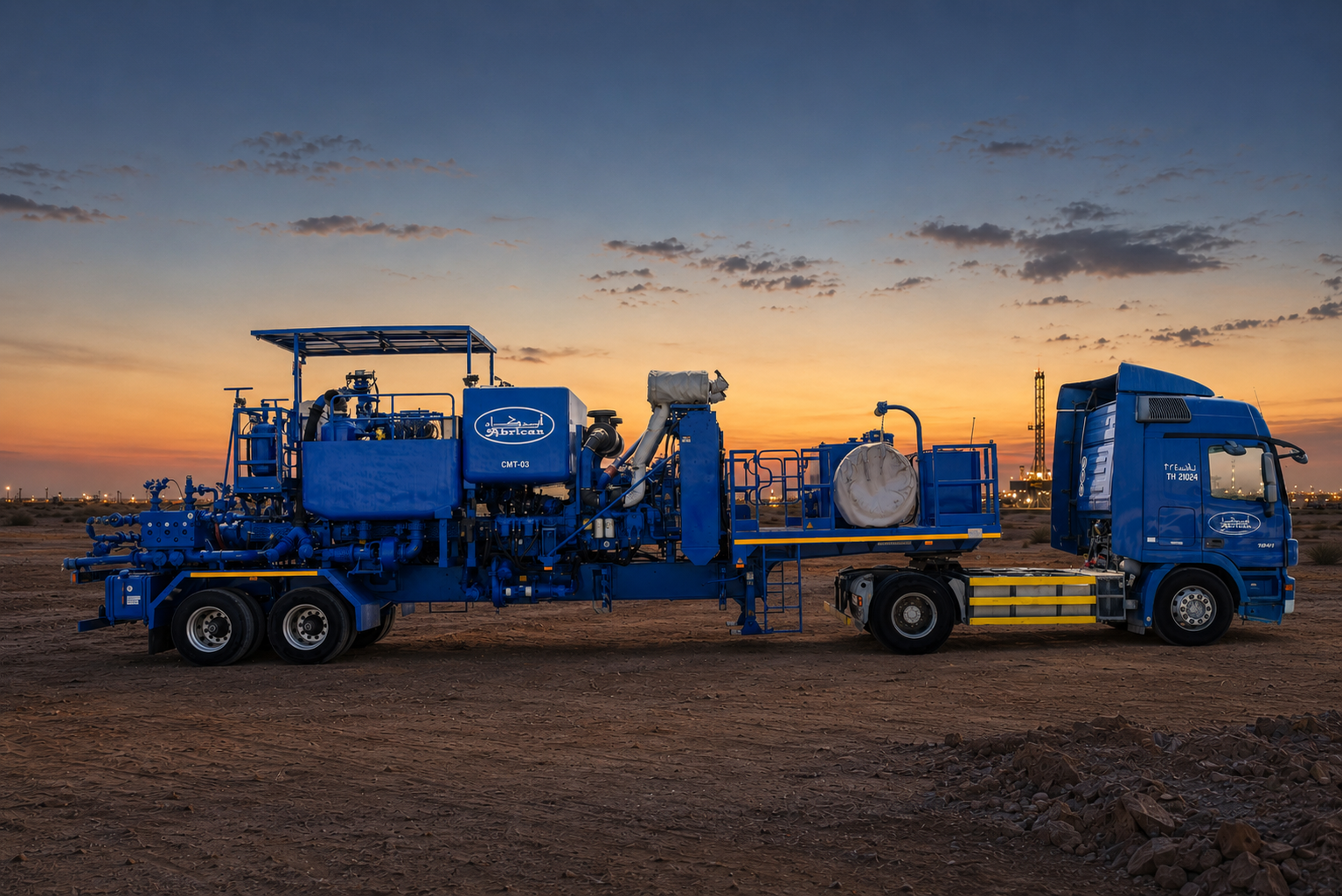 Abrican blue cementing unit and truck at a Saudi oilfield
